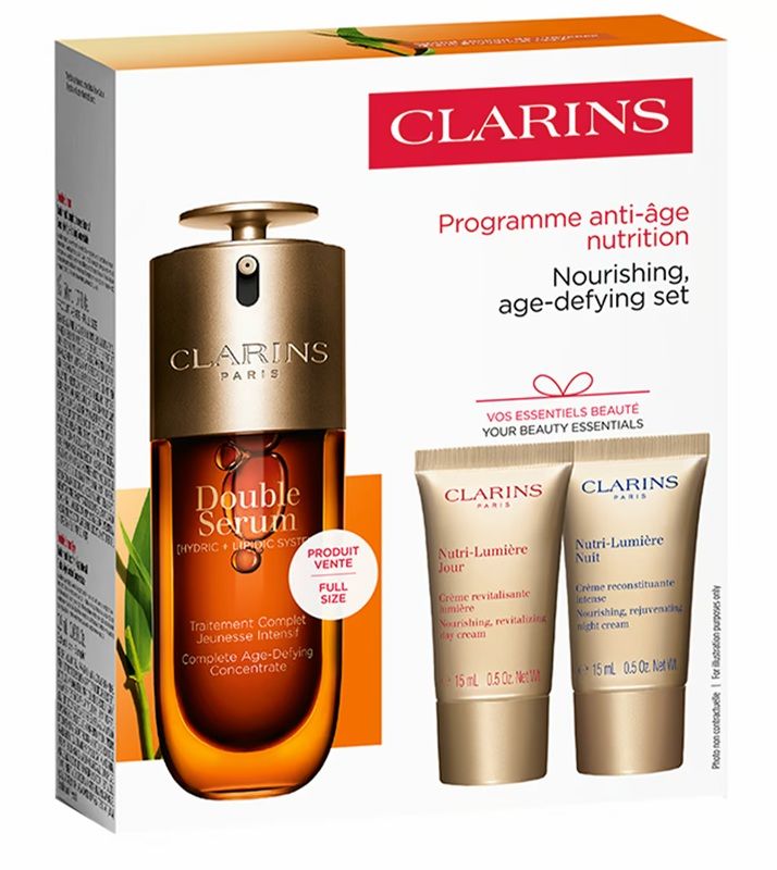 Clarins Set (Double Serum Ser Fata 50ml + Nutri-Lumiere crema zi 15ml + Nutri-Lumiere crema noapte 15ml + Double Serum Ser Ochi 0.9ml)