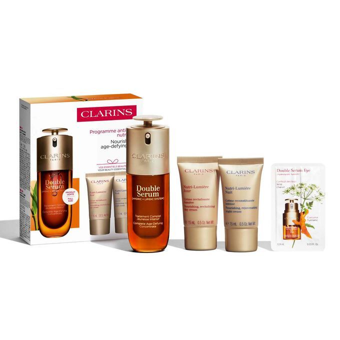 Clarins Set (Double Serum Ser Fata 50ml + Nutri-Lumiere crema zi 15ml + Nutri-Lumiere crema noapte 15ml + Double Serum Ser Ochi 0.9ml)
